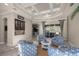 Relaxing living room with cozy seating, high ceilings, and built-in cabinetry at 17819 Sw 61St Lane Rd, Dunnellon, FL 34432