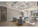 Spacious living area with high ceilings, tiled floors, and seating arrangement at 17819 Sw 61St Lane Rd, Dunnellon, FL 34432
