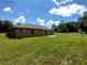 Spacious backyard with grassy lawn at 21 Maple Crse, Ocklawaha, FL 32179
