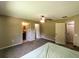 Main bedroom with access to bathroom and closets at 21 Maple Crse, Ocklawaha, FL 32179