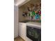Convenient laundry room with washer, dryer, and storage shelves at 3031 Se 5Th Ter # C, Ocala, FL 34471