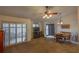 Living room with seating area, fireplace, and dining area at 3031 Se 5Th Ter # C, Ocala, FL 34471
