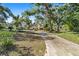 Long driveway leading to a charming ranch home at 3590 Sw 24Th Avenue Rd, Ocala, FL 34471