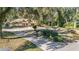 House exterior view with circular driveway and landscaping at 3590 Sw 24Th Avenue Rd, Ocala, FL 34471