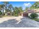 Two-car garage and detached workshop with ample parking at 3590 Sw 24Th Avenue Rd, Ocala, FL 34471