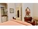 Bright bedroom with ensuite access and elegant furnishings at 3642 Nw 55Th Cir, Ocala, FL 34482