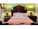Charming guest bedroom with wooden headboard and nightstands at 3642 Nw 55Th Cir, Ocala, FL 34482