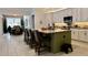 Modern kitchen with an island and stainless steel appliances at 3642 Nw 55Th Cir, Ocala, FL 34482