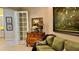 Cozy office with comfortable seating and large artwork at 3642 Nw 55Th Cir, Ocala, FL 34482