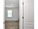 Spacious bedroom with window and carpet at 4313 Sw 106Th Pl, Ocala, FL 34476