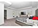 Spacious primary bedroom with large window and en-suite bathroom at 4313 Sw 106Th Pl, Ocala, FL 34476