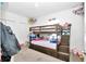 bedroom with bunk bed and ample storage at 4313 Sw 106Th Pl, Ocala, FL 34476