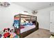 bedroom with bunk bed and stuffed animals at 4313 Sw 106Th Pl, Ocala, FL 34476