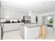 Modern kitchen with stainless steel appliances and granite countertops at 4313 Sw 106Th Pl, Ocala, FL 34476
