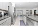 Modern kitchen with stainless steel appliances and granite countertops at 4313 Sw 106Th Pl, Ocala, FL 34476