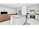 Modern kitchen with stainless steel appliances and granite countertops at 4313 Sw 106Th Pl, Ocala, FL 34476