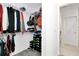 Large walk-in closet with ample hanging and shelving at 4313 Sw 106Th Pl, Ocala, FL 34476