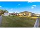 Large backyard with fenced enclosure, shed, and spacious grassy area at 6560 Sw 129Th St, Ocala, FL 34473