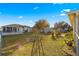 Large backyard with shed, grassy area, and partially visible pool at 6560 Sw 129Th St, Ocala, FL 34473