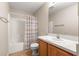 Simple bathroom with shower, toilet and wood vanity at 6560 Sw 129Th St, Ocala, FL 34473