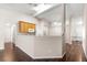 Open concept kitchen with wood cabinets and breakfast bar at 6560 Sw 129Th St, Ocala, FL 34473