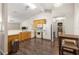 Kitchen boasts ample cabinetry, wood flooring and modern appliances at 6560 Sw 129Th St, Ocala, FL 34473