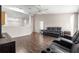 Spacious living room with hardwood floors and comfortable seating at 6560 Sw 129Th St, Ocala, FL 34473