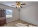 Bedroom with ceiling fan and large window at 83 Almond Rd, Ocala, FL 34472