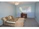 Bedroom with double bed, dresser, and ceiling fan at 10886 Sw 90Th Ter, Ocala, FL 34481