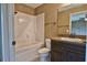 Clean bathroom with tub, toilet and vanity at 14893 Sw 63 Court Rd, Ocala, FL 34473