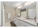 Bathroom with double vanity and granite countertop at 176 Pine Crse, Ocala, FL 34472