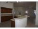 Kitchen with an island, wood cabinets, and a breakfast nook at 6688 Sw 113Th Pl, Ocala, FL 34476