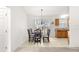 Casual dining area with a table and chairs, adjacent to the kitchen at 6845 Se 52Nd St, Ocala, FL 34472