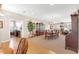 Formal dining room featuring a large table and wood hutch at 9083 Sw 99Th Court Rd, Ocala, FL 34481