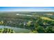 Community overview with golf course, lake, and various houses at 9146 Sw 65Th Loop, Ocala, FL 34481