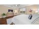 Bedroom with hardwood floors, a ceiling fan, and a neutral color scheme at 9146 Sw 65Th Loop, Ocala, FL 34481