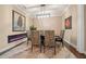 Elegant dining room with a modern fireplace and stylish chairs at 9146 Sw 65Th Loop, Ocala, FL 34481