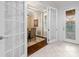 Open entryway with French doors leading to dining area at 9146 Sw 65Th Loop, Ocala, FL 34481