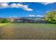 House exterior view showcasing a large backyard at 9146 Sw 65Th Loop, Ocala, FL 34481