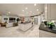 Open concept kitchen boasting an island, granite countertops, and stainless steel appliances at 9146 Sw 65Th Loop, Ocala, FL 34481