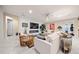 Living area with a modern electric fireplace and comfortable seating at 9146 Sw 65Th Loop, Ocala, FL 34481