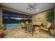 Inviting pool and patio area with seating, perfect for outdoor entertaining at 9146 Sw 65Th Loop, Ocala, FL 34481