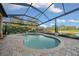 Enjoy this relaxing pool and spa area with a covered patio at 9146 Sw 65Th Loop, Ocala, FL 34481