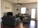 Bright living room with hardwood floors and comfy seating at 9781 Sw 57Th Ave, Ocala, FL 34476