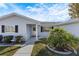 Inviting front entrance with walkway and landscaping at 10368 Se 178Th Pl, Summerfield, FL 34491