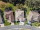 Three homes shown from above in a quiet, residential neighborhood at 12157 Se 175Th Loop, Summerfield, FL 34491