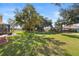 Large grassy backyard with mature trees and privacy at 12157 Se 175Th Loop, Summerfield, FL 34491