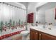 Clean bathroom with a shower/tub combo and snowman-themed decor at 12157 Se 175Th Loop, Summerfield, FL 34491