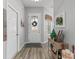 Bright and spacious entryway with a decorative console table at 12157 Se 175Th Loop, Summerfield, FL 34491