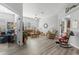 Spacious living room featuring hardwood floors and ample natural light at 12157 Se 175Th Loop, Summerfield, FL 34491